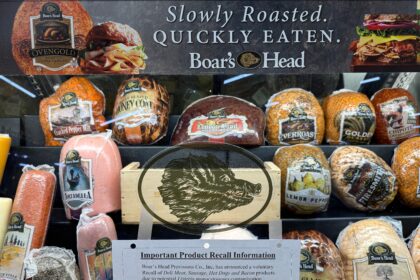 Boar's Head deli meat display showing various products with a product recall notice due to potential Listeria contamination.